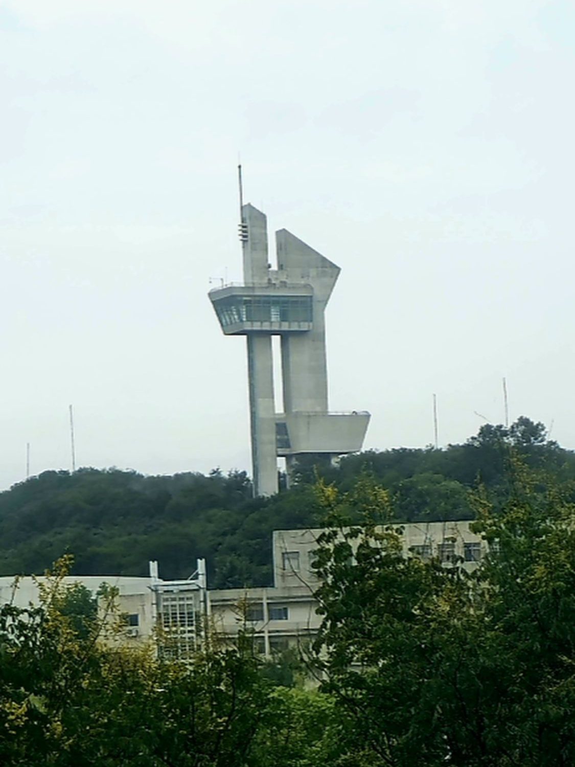 I can see this odd shaped tower from my apartment window. It is not on the campus.